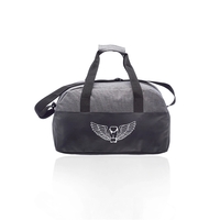 Executive duffel bag with a two-tone design, zippered main compartment,...