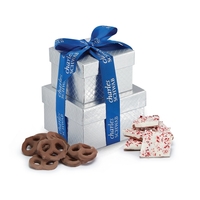 Silver-boxed gift tower featuring milk chocolate pretzels and peppermint...