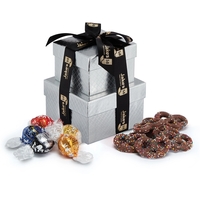 Silver-boxed gift tower featuring Lindt® truffles and milk chocolate...