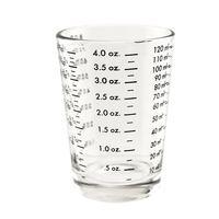 Professional measuring glass jigger with thick base for stability.... from...