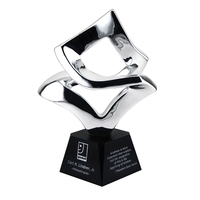Concordia chrome art sculpture award embedded into genuine black marble.......