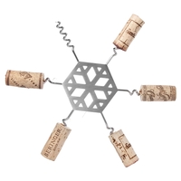 Snowflake-shaped 6 3/8" stainless steel cork trivet to protect counter...