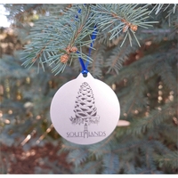 Ornament made of iron measuring 2" with an engraved imprint.... from ASI...