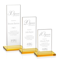 This illustrious Starfire Crystal award stands upright on an elegant Amber......