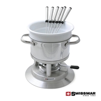 his multi-purpose fondue has a ceramic insert that acts as a... from ASI...