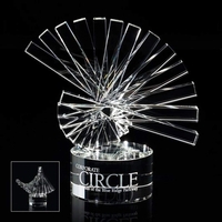 Cut and beveled optical crystal rods are spiraled together in this... from...