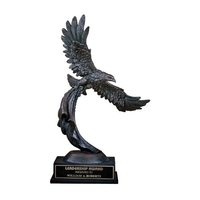 Stonecast award of flying eagle carrying flag, antique bronze with plate......