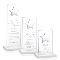 This illustrious Starfire Crystal award stands upright on an elegant White......