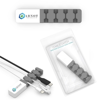 Cord organizer for managing up to four cords, cables or headphones... from...