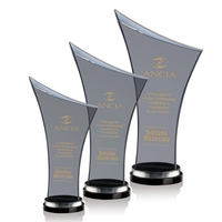 The smoky surface of black crystal imparts a contemporary feel to... from ASI...