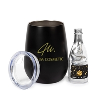 Gift set including 12 oz stemless wine glass and plastic champagne... from...
