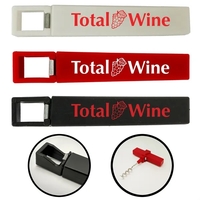 This multifunction tool features a bottle opener and removable corkscrew....