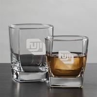 Modern On-the-Rocks glass and Double Old Fashioned featuring a square sham......