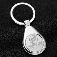 Raindrop shaped metal keyholder with matte finish and chrome accents.... from...