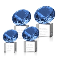 This award features a stunning sapphire gemstone mounted onto a reflective......