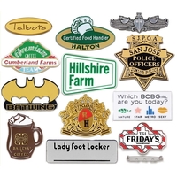 Custom molded plastic badge with the 3-dimensional, multi-level...