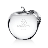 A colorless glass apple, approximately 2.75” in diameter, with molded stem......
