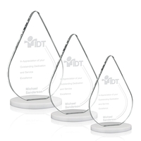 An elegant flat-edged pane of Starfire Crystal shaped like a droplet... from...