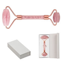 Face roller made of rose quartz crystal in a white gift... from ASI 62190 Illini