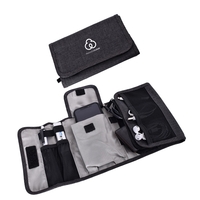 Trifold electronics organizer with multiple compartments for tools, cords,...