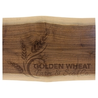 A 13 3/4" x 9 3/4" black walnut cutting and charcuterie... from ASI 72657...