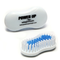 This compact nail brush features a plastic handle for an easy... from ASI...