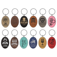 1.75" x 3" engraved premium leatherette oval keychain.... from ASI 92531...