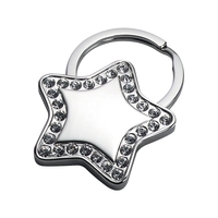 Star shape key chain with clear stone.... from ASI 55540 Furniward Company /...