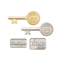 Die Struck brass lapel pin, sandblasted background with polished highlights,...