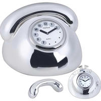 Silver telephone shape clock, lift receiver, and clock rings like a... from...