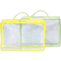 Clear vinyl accessory bag with zippered closure and comfortable handles.......