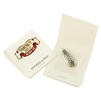 Nickel hammered spoon fishing lure in matchbook