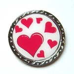 Ball marker with red hearts design