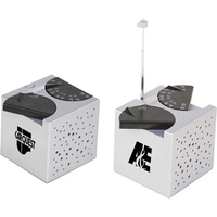 Cube shape AM/FM desk radio folds into a perfect cube paperweight... from ASI...