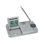 Slim traveler AM/FM radio/alarm clock/flashlight
