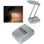 Silver collapsible reading light with flashlight
