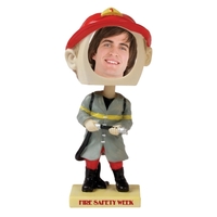 6 1/2" x 2 1/2" firefighter bobblehead with slip-in insert section... from...