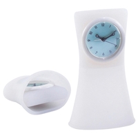Clear silicon alarm clock, with glow dial, folds into itself for... from ASI...