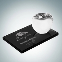 Molten glass apple with leaf attached two a black, smoke glass... from ASI...