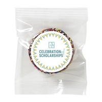 Chocolate covered Oreo® cookie with rainbow nonpareil sprinkles wrapped in...