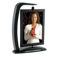 Magnetic spinning photo frame that holds a 5" x 7" photograph.... from ASI...