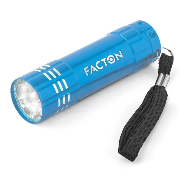 15/16" x 3 1/2" aluminum flashlight with a push button, ribbed... from ASI 88060 Snugz/USA Inc / Sweda®