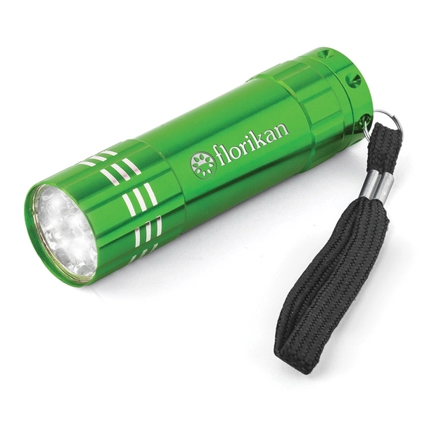 15/16" x 3 1/2" aluminum flashlight with a push button, ribbed... from ASI 88060 Snugz/USA Inc / Sweda®