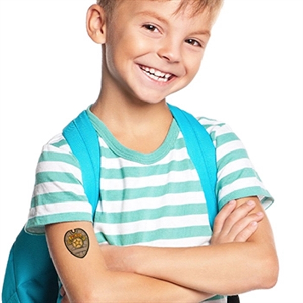 Police badge shaped temporary tattoo, designed to last on the skin... from ASI 43530 California Tattoos