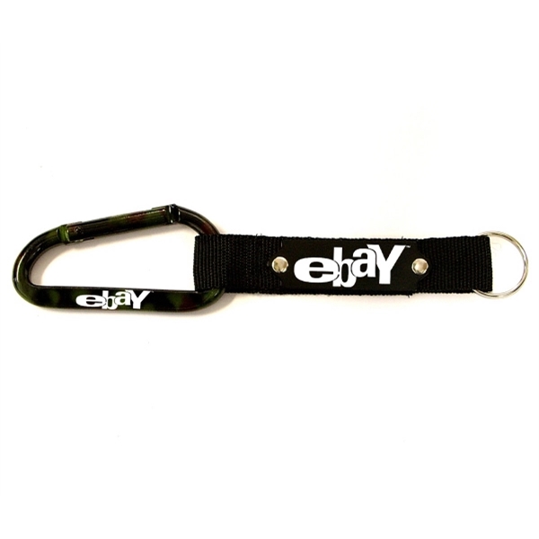 Carabiner with strap and metal plate, solid aluminum construction.... from ASI 74585 Nu Promo International / Nu Promo Line