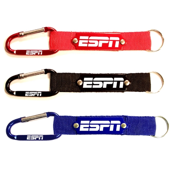 Carabiner with strap and metal plate, solid aluminum construction.... from ASI 74585 Nu Promo International / Nu Promo Line