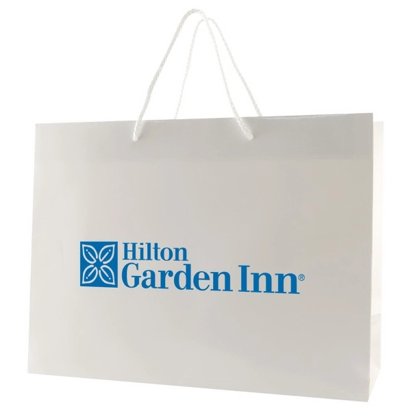 Made from 180 GSM gloss laminated paper, these shopping totes feature... from ASI 75731 PWS / Pacific Western Sales/Cater Line