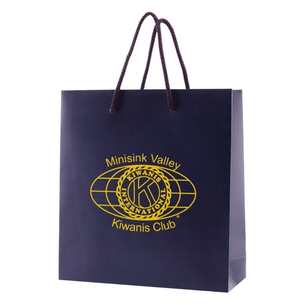 Made from 180 GSM matte laminated paper, these shopping totes feature... from ASI 75731 PWS / Pacific Western Sales/Cater Line