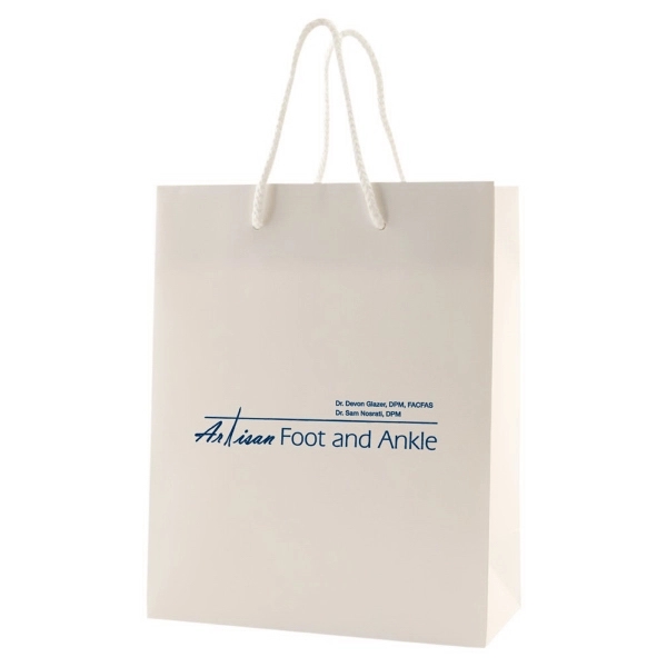 Made from 180 GSM matte laminated paper, these shopping totes feature... from ASI 75731 PWS / Pacific Western Sales/Cater Line