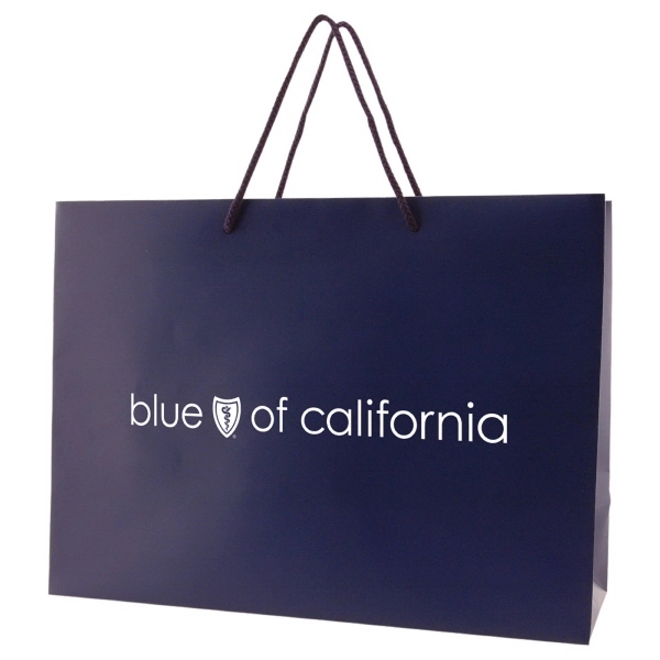 Made from 180 GSM matte laminated paper, these shopping totes feature... from ASI 75731 PWS / Pacific Western Sales/Cater Line